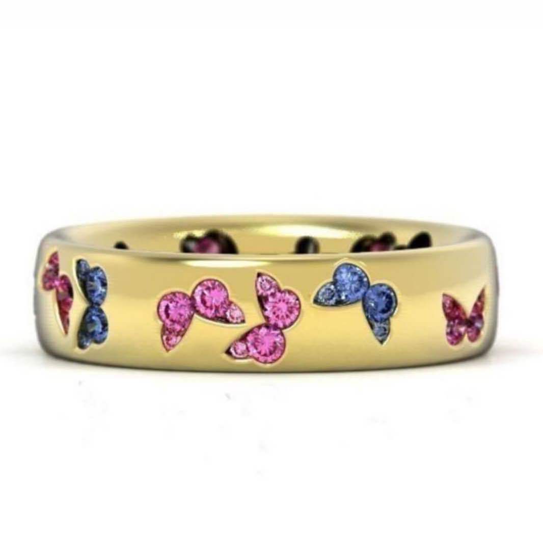 Ornament: Exquisite, mit Schmetterlingen eingelegte Ringe in verschiedenen Farben