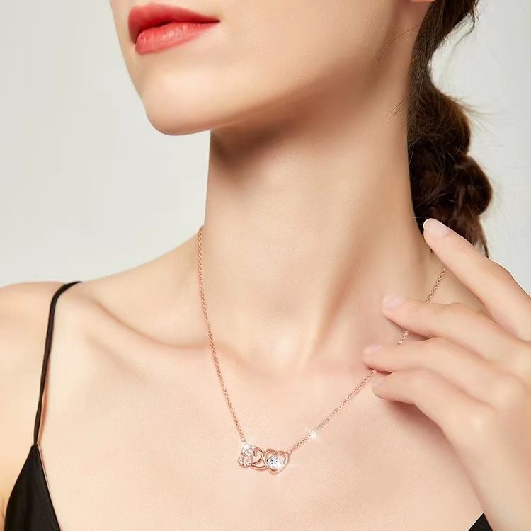 Colliers de chaîne de clavicule de niche de coeur pulsatile féminin de luxe