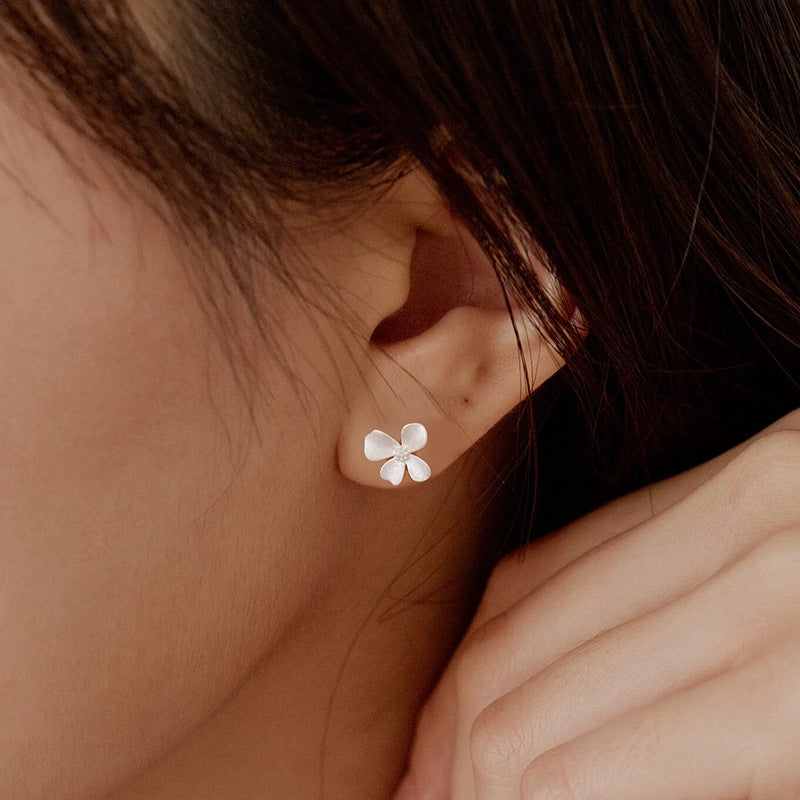 Simple And Irregular Small Flower Light Earrings